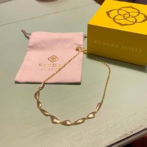 Kendra Scott necklace with bag and box